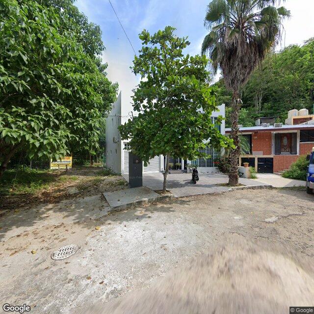 La Crucecita, the town that holds the relocated — Google Street View, August 2025 ((c) Google)