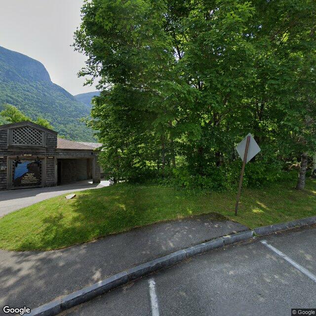 The building at the Old Man of the Mountain Historic Site, and its lot. Imagery captured June 2024.